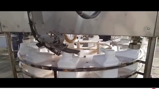 دستگاه پرکن و درب بندی کود مایع توان صنعت / 09152000050