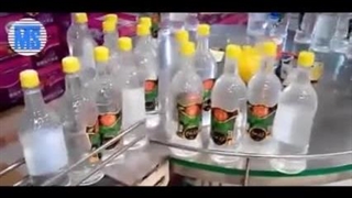 دستگاه پرکن دربند گلاب و عرقیات منوبلوک توان صنعت / 09152000050