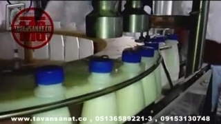 دستگاه پرکن شیر توان صنعت / 09152000050