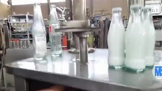 دستگاه دربند بطری شیشه نوشابه درب تشتکی توان صنعت / 09152000050