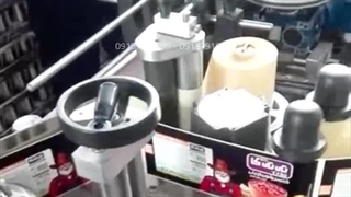 لیبل زن پشت چسبدار اتوماتیک ظروف گرد 09157100071